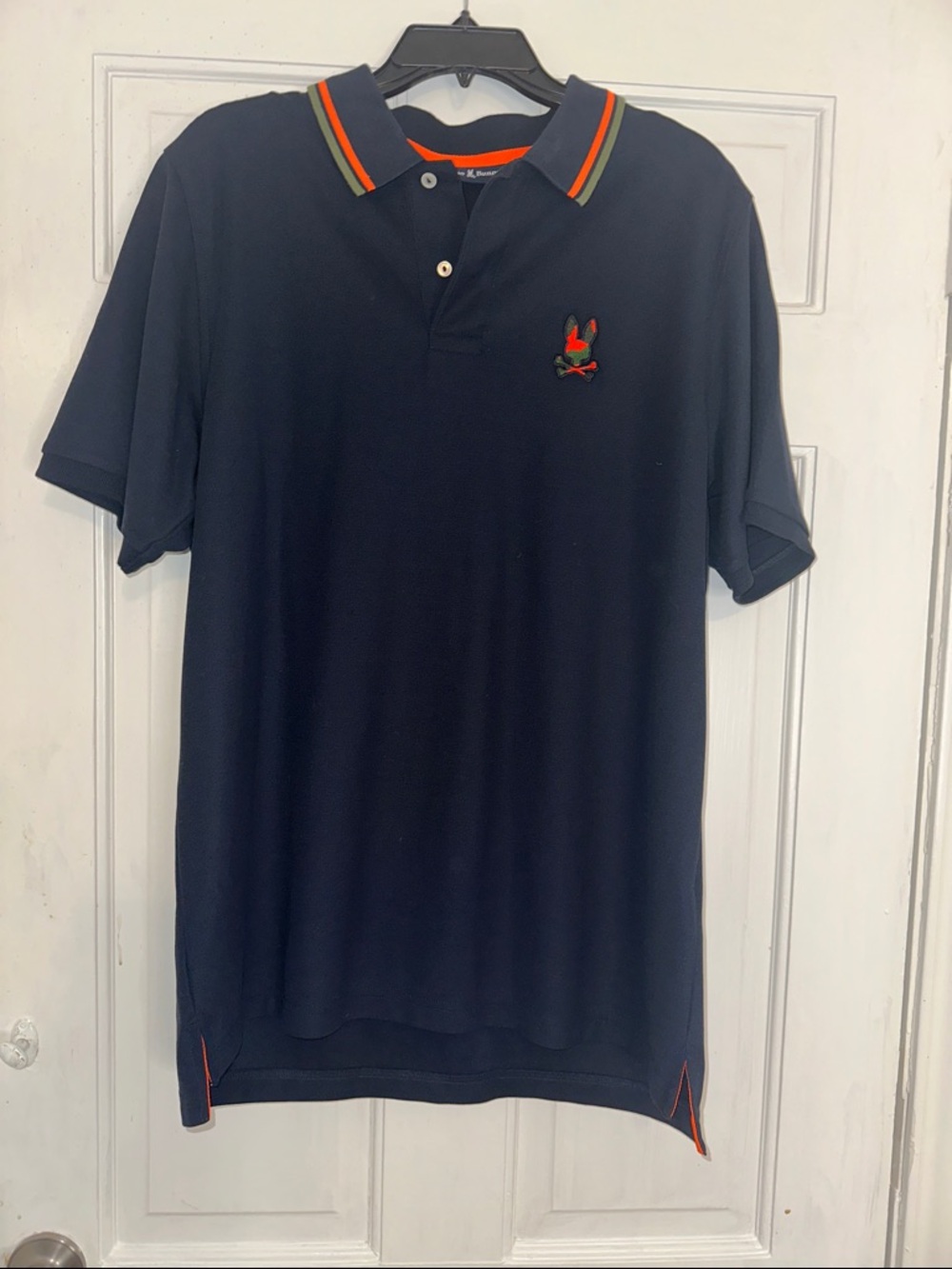 Psycho Bunny Navy Polo with Orange Accent Men’s 7